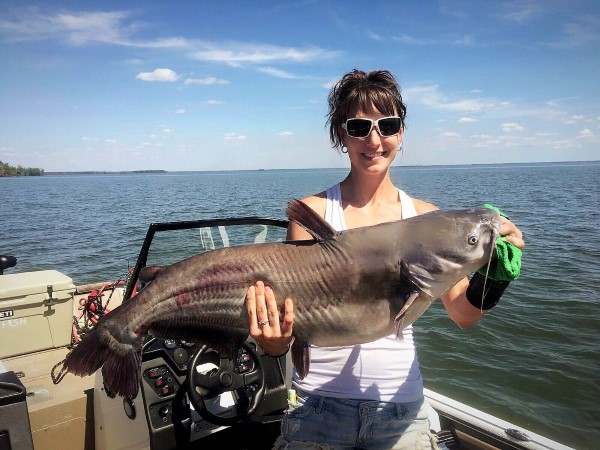 Hard work has paid off for Jessica as she has focused her attention on learning more about catching trophy catfish like the one she’s holding here.
